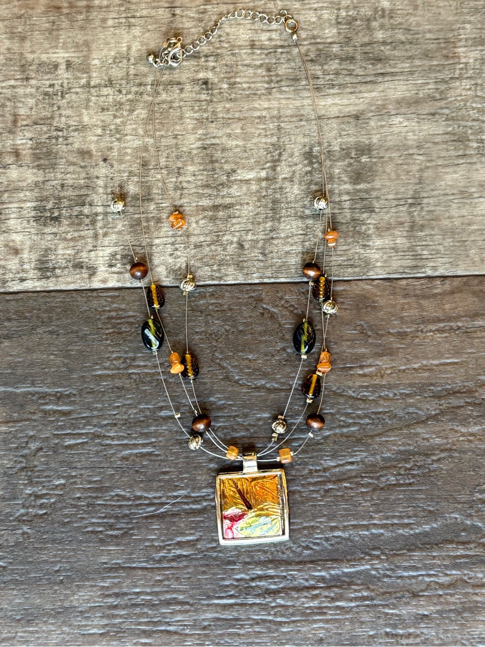Kenneth Cole Multicolor Glass Pendant Necklace with Amber and Brown Accents